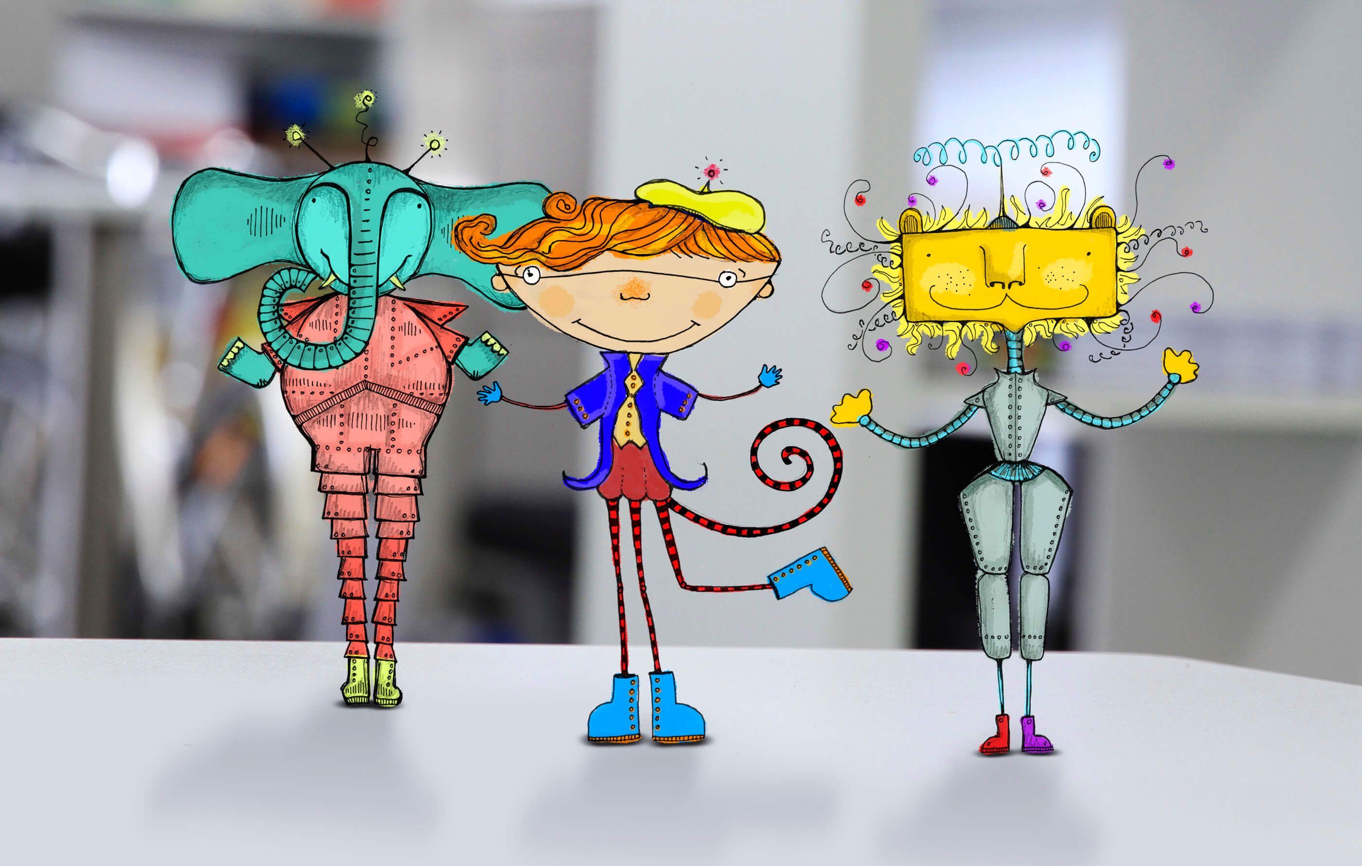 Three characters from the game stood on a table, including a teal elephant, ginger-haired boy and a yellow square-headed lion