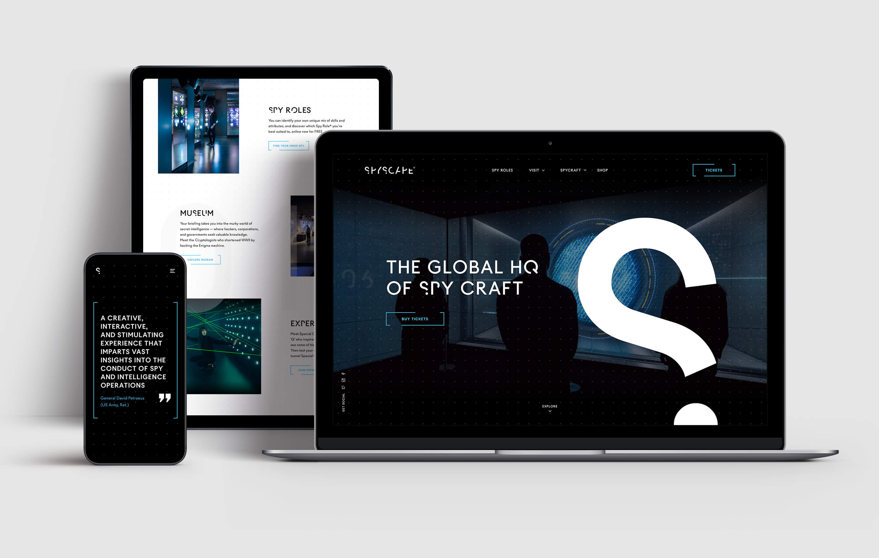 Final render of the responsive Spyscape website, shown on desktop, tablet and mobile phone on a light grey background